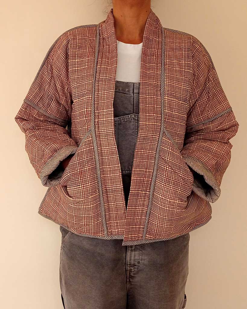 https://cottonconscious.com/wp-content/uploads/2022/08/quilted-kimono-jacket-reversible-red-check-2.jpg