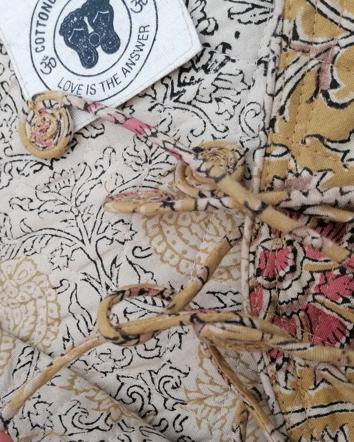 handwoven organic cotton quilted dress reversible tie front pink floral print ochre