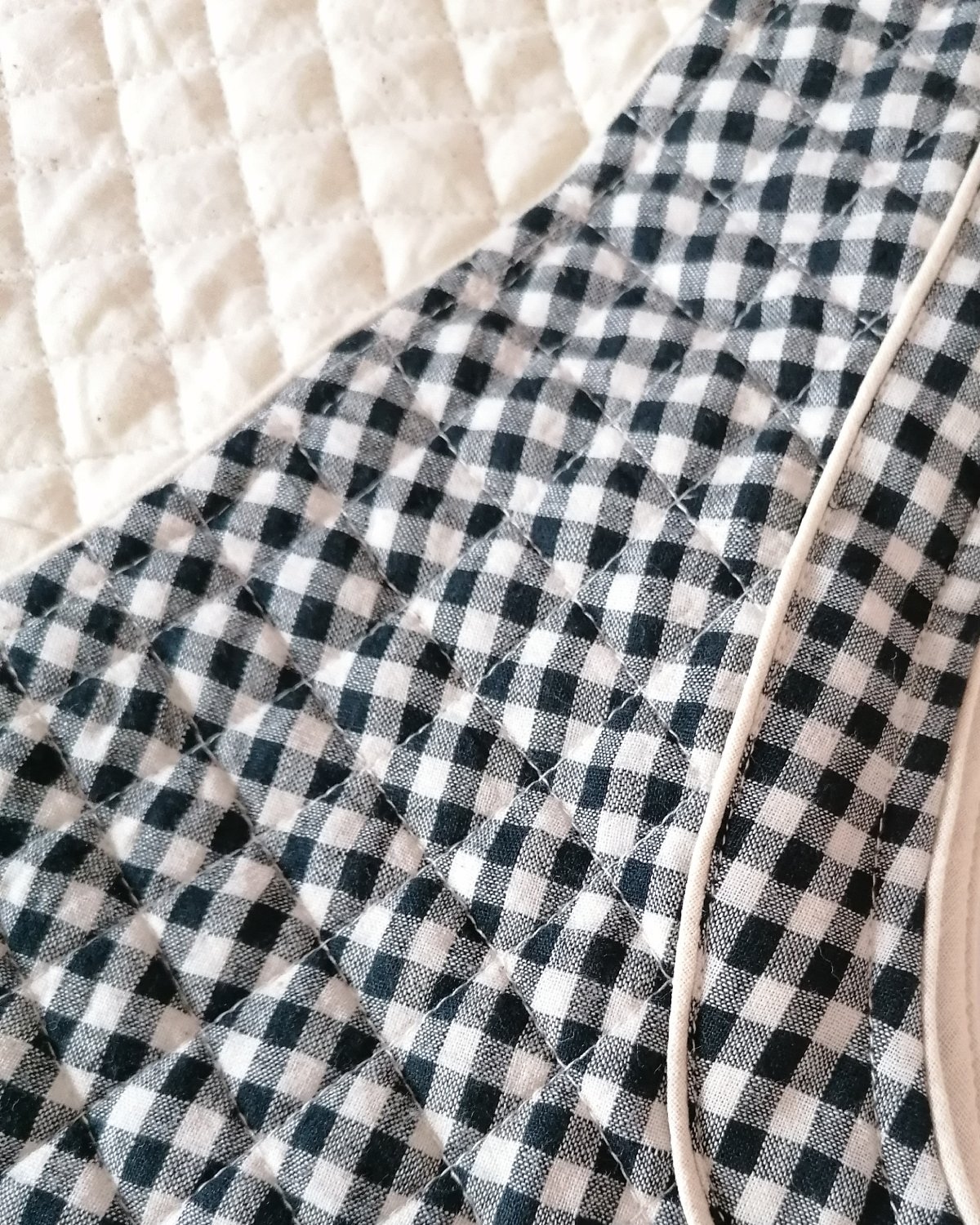 close up of gingham check with natural organic cotton contrast