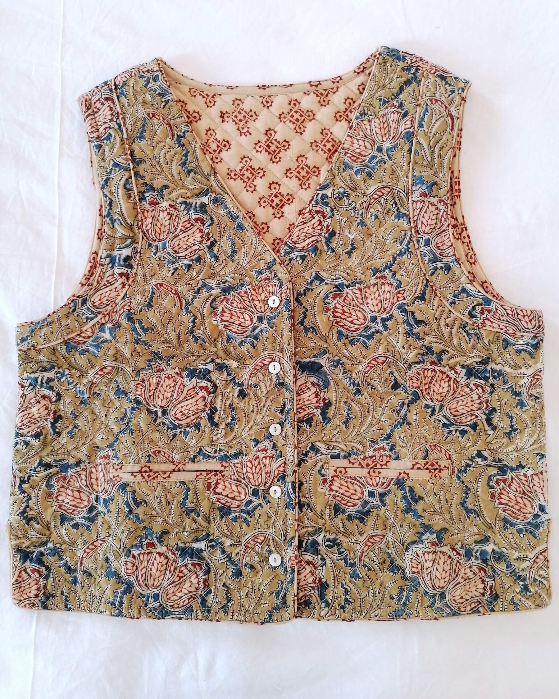 Organic Cotton Quilted Waistcoat in olive green block print with pockets